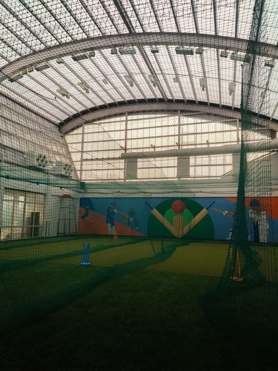 Indoor cricket nets in a sports hall